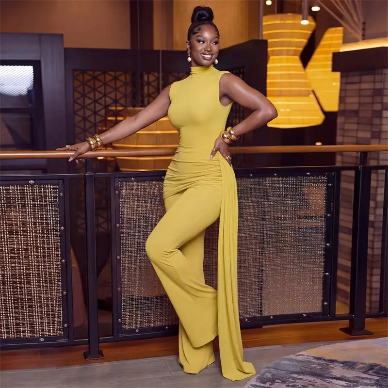 A vibrant yellow high-necked ruched high neck flare outfit jumpsuit with side slit and wide-leg design in piece sets woman featuring a pull closure type.