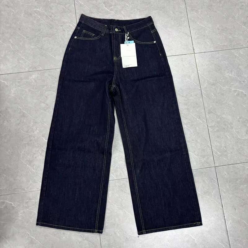 Iefb men black vintage wide leg jeans in dark indigo denim with contrasting white stitching and a high waist.