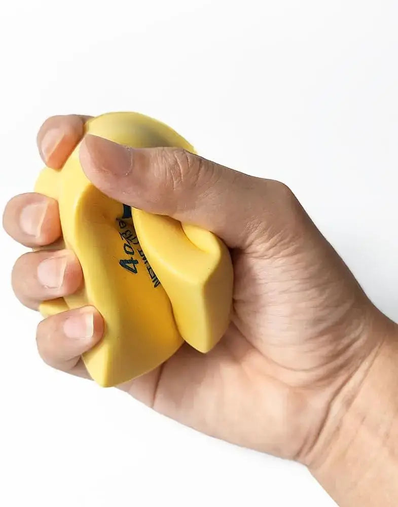 Yellow silicone slow rising squishy butter stress relief toy with black text mochi 4 on the surface designed as a butter squeeze.