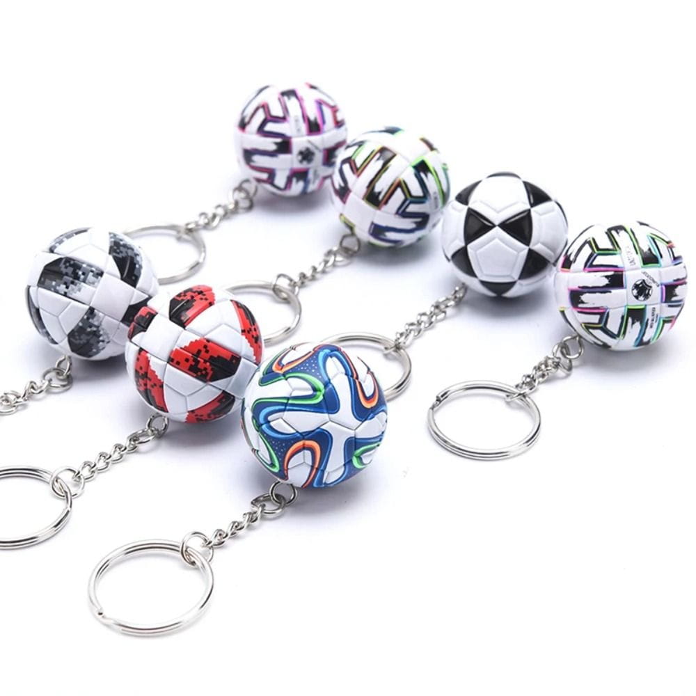 Colorful miniature leather football keychain sports souvenir pendants with metallic chains and rings.