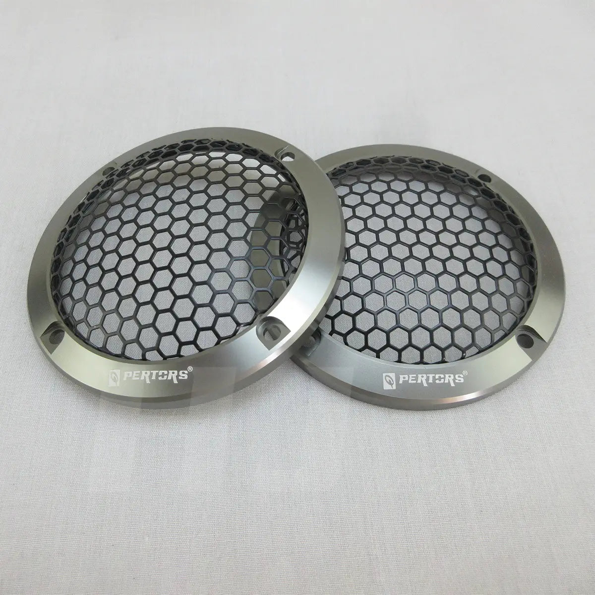 Silver hexagonal mesh speaker grilles with a sleek metallic finish and pertsrs branding on 3.5 inch 200w qp353f car coaxial speakers.