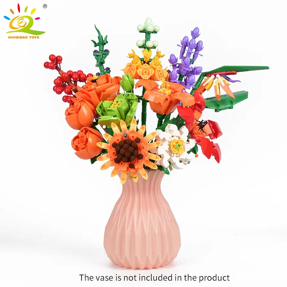 Un bouquet multicolore éclatant de fleurs construites en briques Lego dans un vase rose, issu de l’ensemble de bouquet de fleurs en briques, conçu pour les amateurs de blocs.