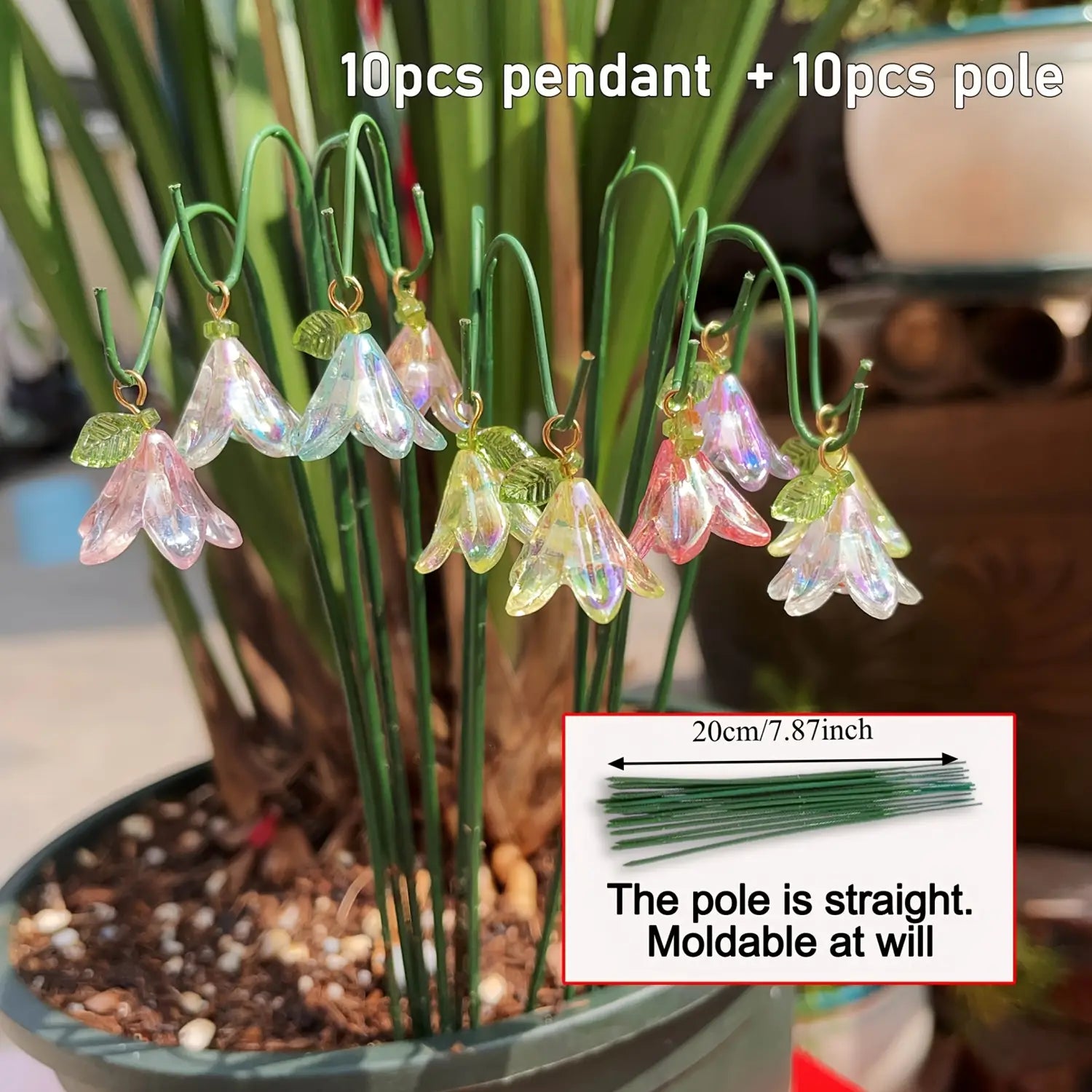 Glass lily garden stakes plant decor features delicate iridescent glass bell-shaped pendants with green leaf accents hanging from slender green metal poles.