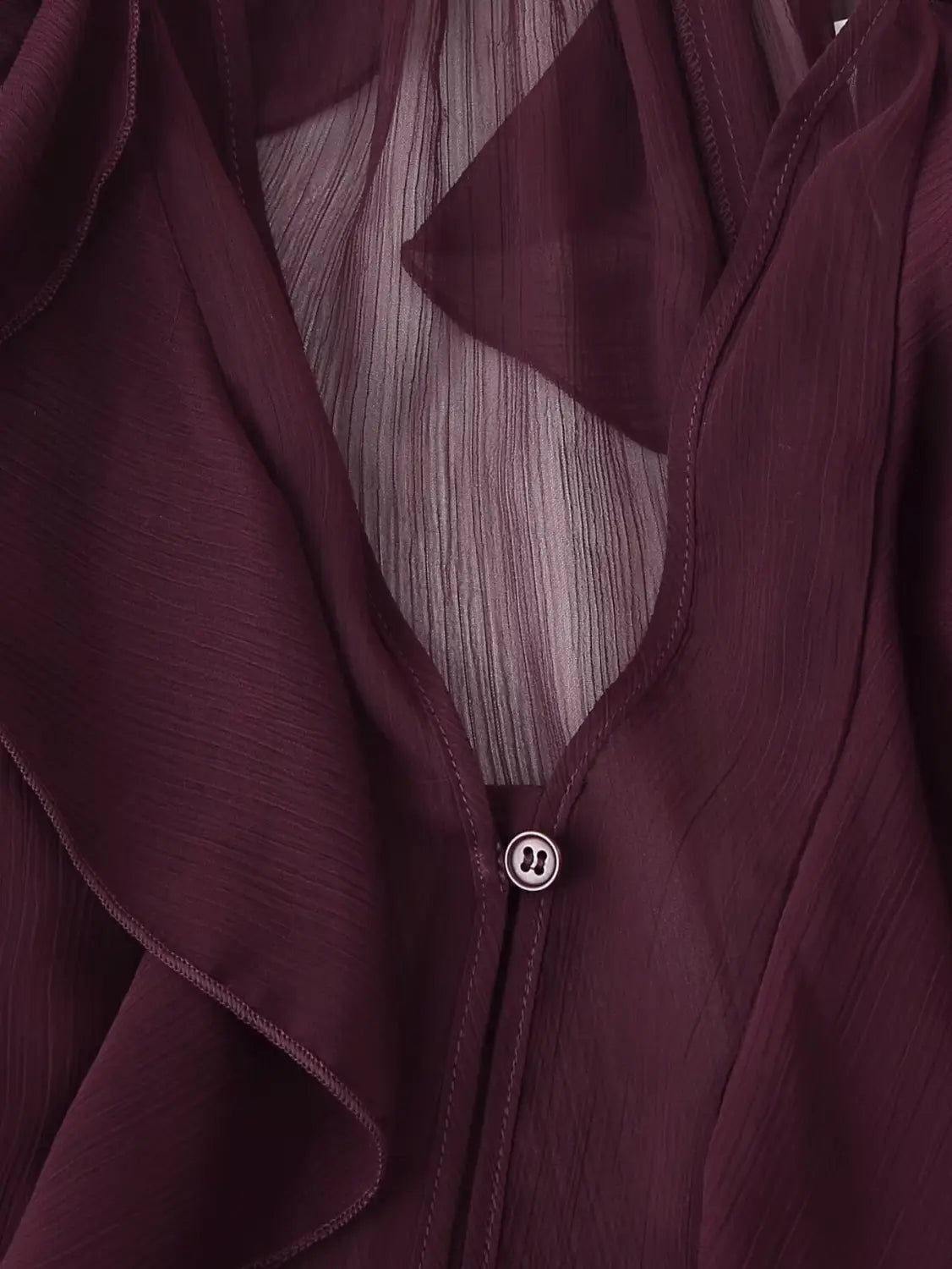 a maroon sheer chiffon ruffle shirt long sleeve v-neck blouse with a silver lululemon logo button
