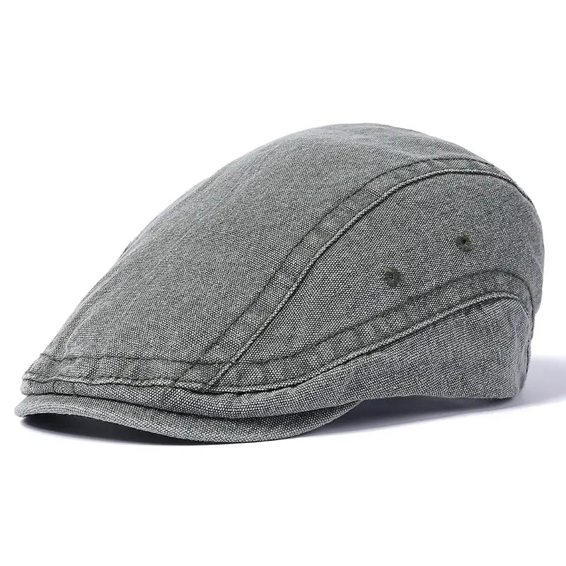 Graue strukturierte Denim-Flachmütze mit genähten Paneelen und Knopfdetails, Vintage-Béret-Stil, verstellbare Mütze