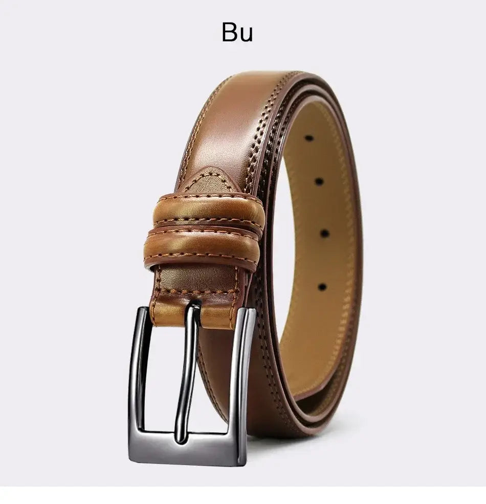 A genuine leather men reversible belt in medium brown with a sleek design, polished silver-toned buckle, and subtle stitching along the edges.