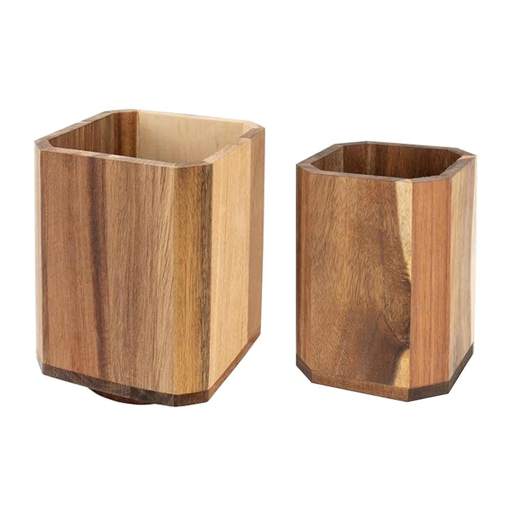 Two hexagonal wooden rotating kitchen utensil holders with natural wood grain and a warm medium brown finish for countertop organization.