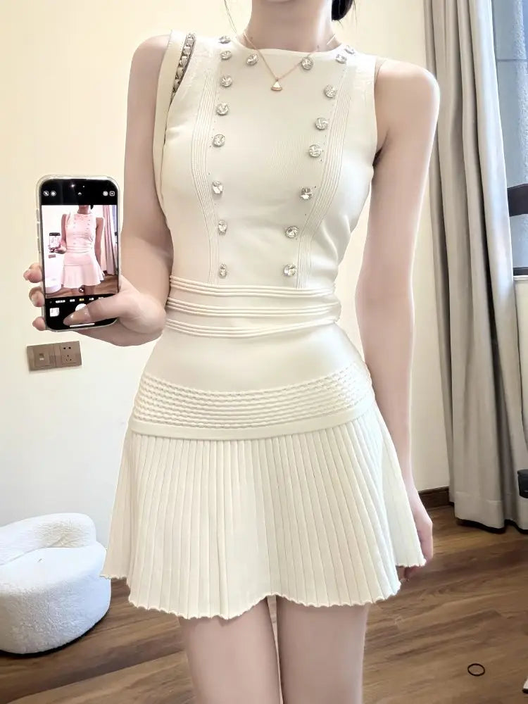 Women Chic Two Piece Set Sleeveless Knit Tank Top and High Waist Pleated Mini Skirt Pearl Detail Slim Fit Suit Minimalist Outfit