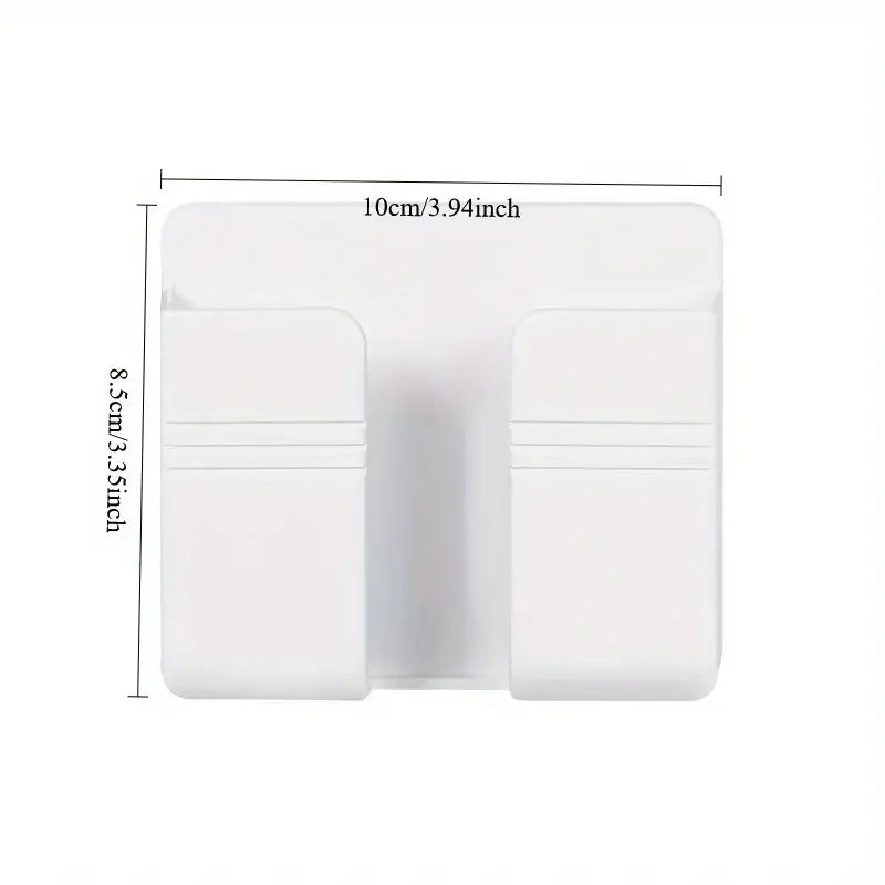 white plastic wall mount phone charging holder with dual-pocket vertical compartments and horizontal dividers for organizing small items such as keys or cards measuring 10cm wide and 8.5cm tall