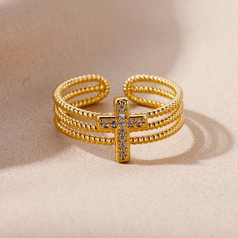 Gold color stainless steel adjustable ring for women featuring a beaded multi-strand design and a central cross adorned with clear crystals, suitable for vintage wedding jewelry.