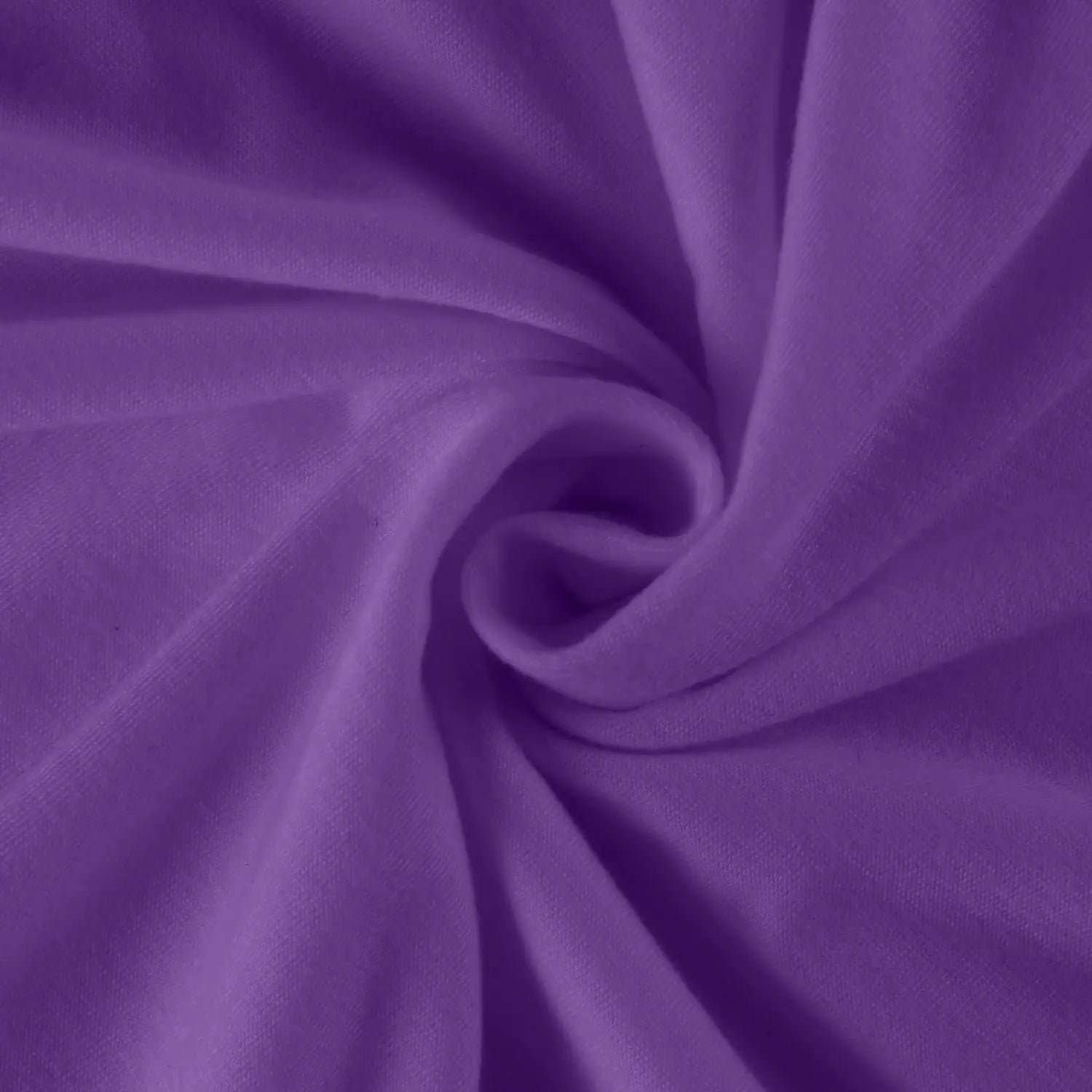 A soft solid purple cotton fabric with a smooth texture and subtle sheen featured in a women long sleeve tunic top with a round neck and no visible pattern type.