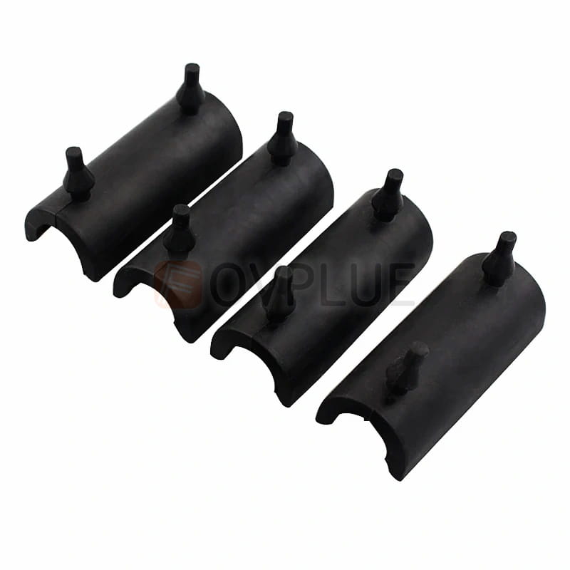 Black rubber hose couplings with rounded ends and small protruding tabs from the Harley Touring Saddlebag Support Grommet Kit 1993 up.