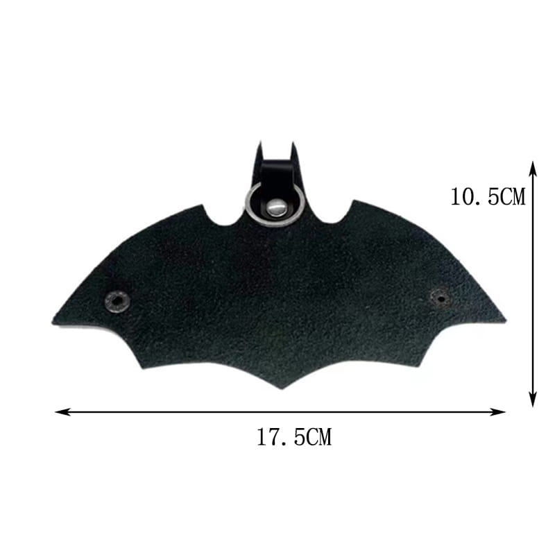 Black bat-shaped leather Batman keychain with silver metal ring and rivets for holding keys and cards.