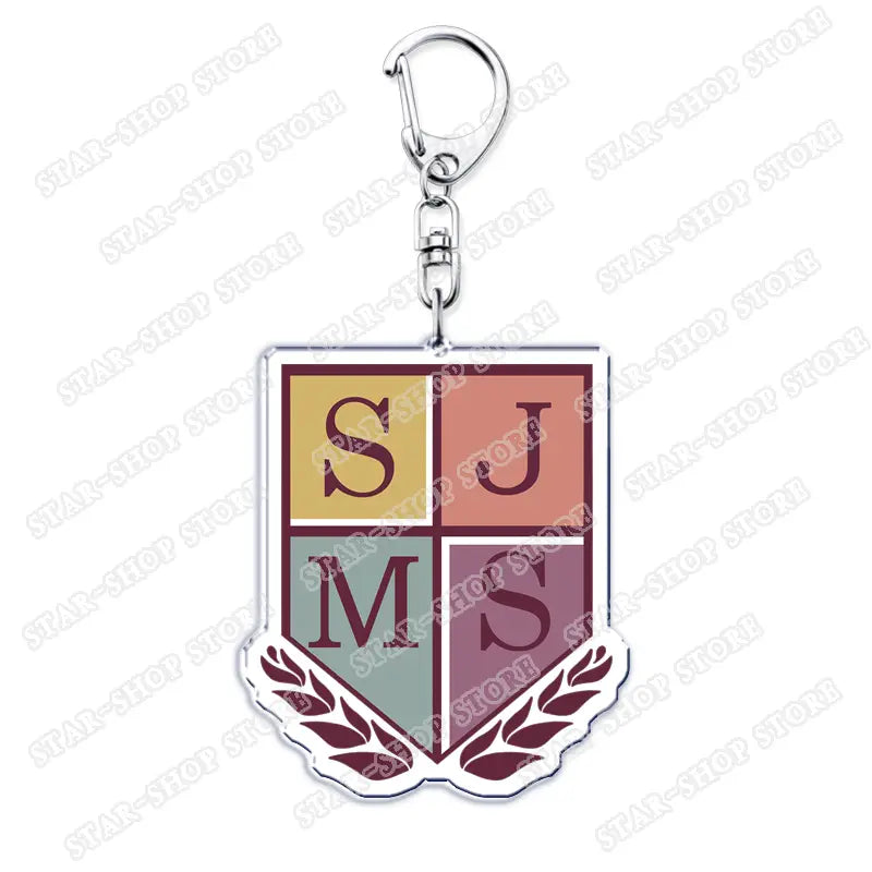 a metallic acrylic keychain featuring a shield-shaped emblem with yellow, peach, teal, and maroon quadrants and bold s, j, m, s letters for an amphibia anime cartoon keyring
