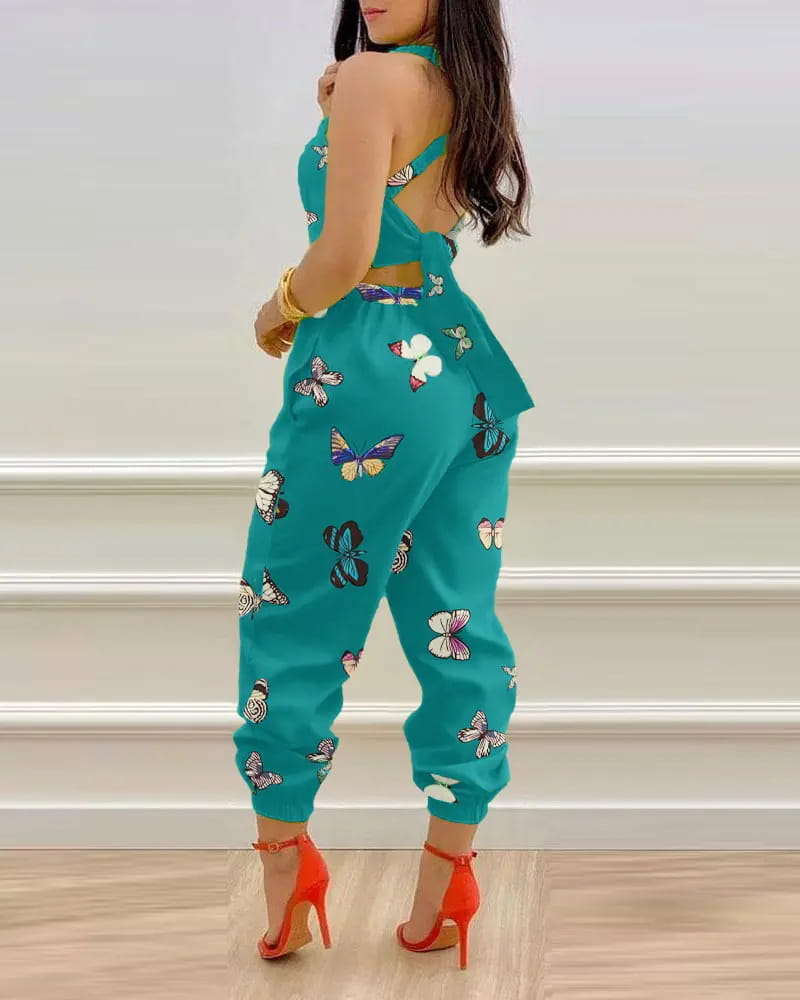 Teal butterfly-print halter jumpsuit with peplum waist and cuffed hems for women summer printed cutout jumpsuit.