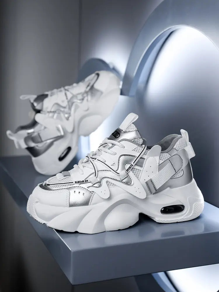 Men chunky air cushion casual sneakers in white and silver with a futuristic layered design featuring mesh panels and metallic accents