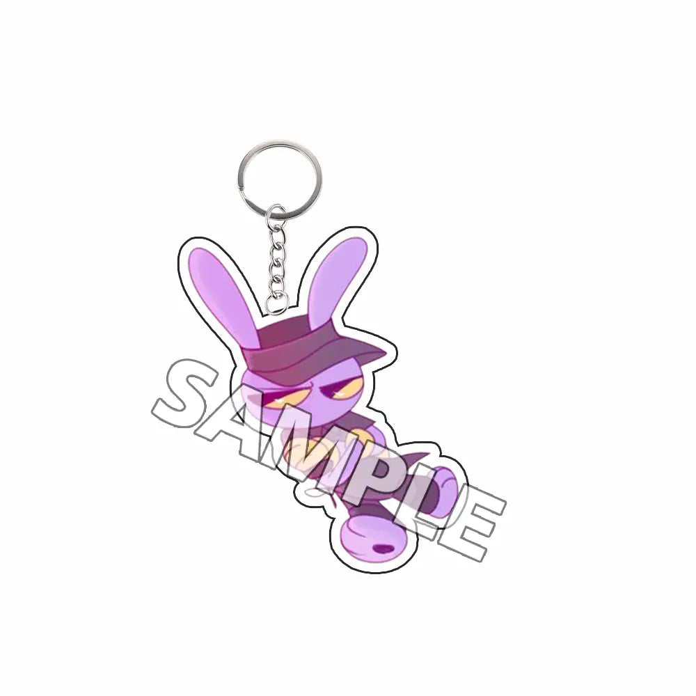Llavero acrílico con forma de conejo morado, hecho de material traslúcido, con un sombrero negro y ojos amarillos; incluido como producto terminado de la colección de personajes tipo Tadc.