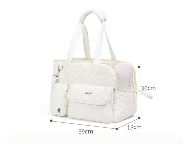 Bolsa transportín acolchada blanca para mascotas con panel lateral transparente y asas ajustables, diseñada para gatos y perros pequeños.