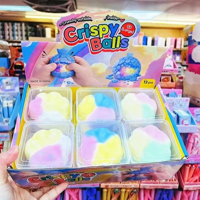 boîte d’affichage contenant 12 boules de jouet antistress à tourbillon arc-en-ciel colorées, fabriquées en matériau plastique sans BPA, conçues pour une utilisation comme antistress à presser