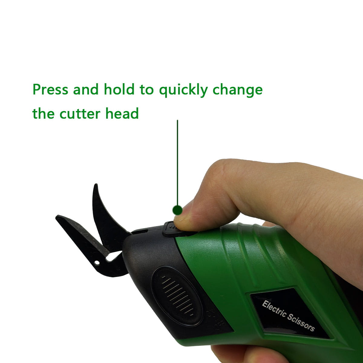 Green and black electric scissors cordless usb rechargeable fabric cutter with a replaceable cutter head.