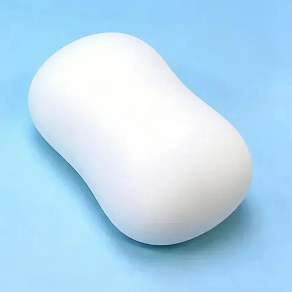 Un bloc solide blanc lisse en forme de fromage, jouet à mâcher et à malaxer, bords arrondis et finition brillante, pour soulager le stress et apaiser le stress lié au jouet.