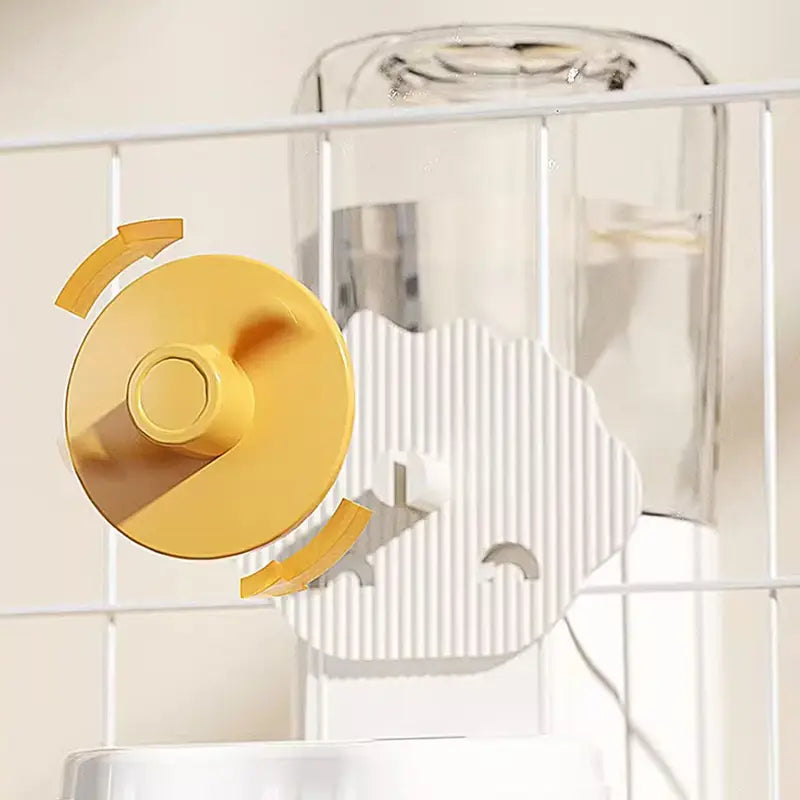 Yellow circular knob with central cylindrical handle made of plastic or metal on hoopet wall mounted automatic pet feeder and water dispenser.