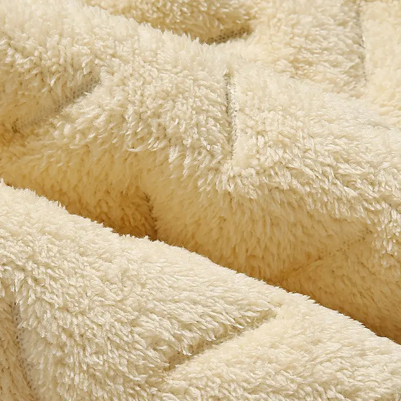 men fleece lined thermal sweatpants featuring cream-colored plush fleece fabric with a soft textured surface and quilted stitching for waterproof winter wear