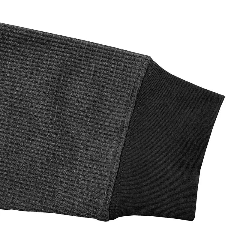 Herren-Waffel-Langarm-Henleyhemd mit schwarzem geripptem Strickärmel und kontrastierend glattem schwarzem Bündchen im einfarbigen, lässigen Oberteil-Design