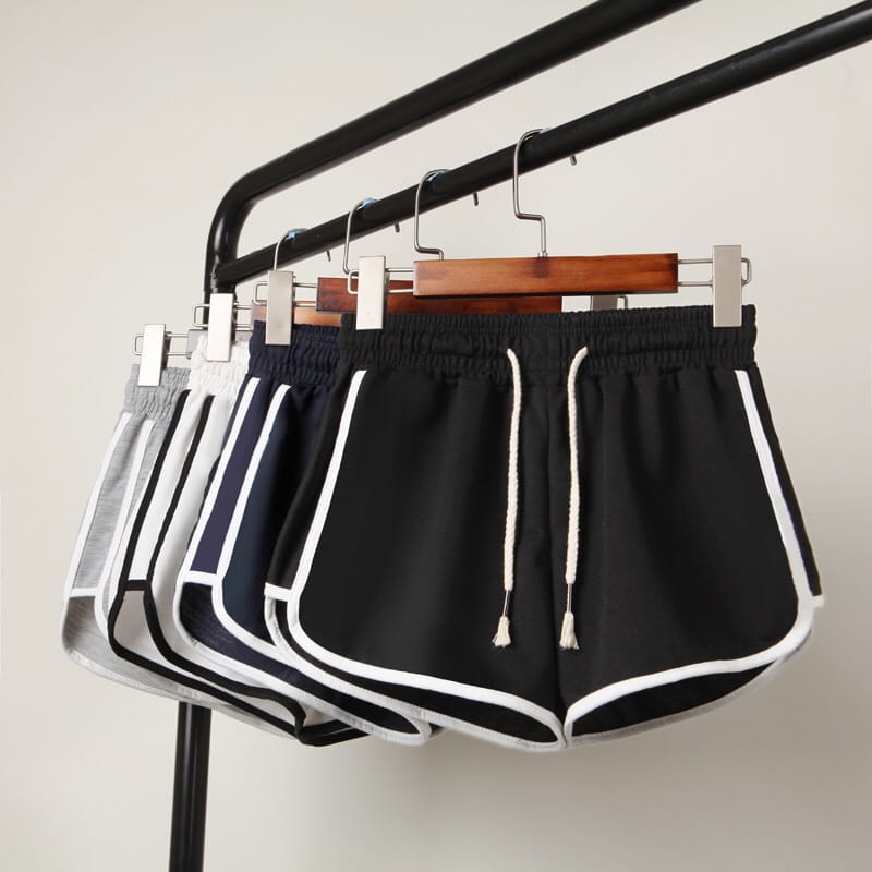men athletic shorts 3-pack with black color, white trim, and drawstring waistband designed for running and athletic activities.