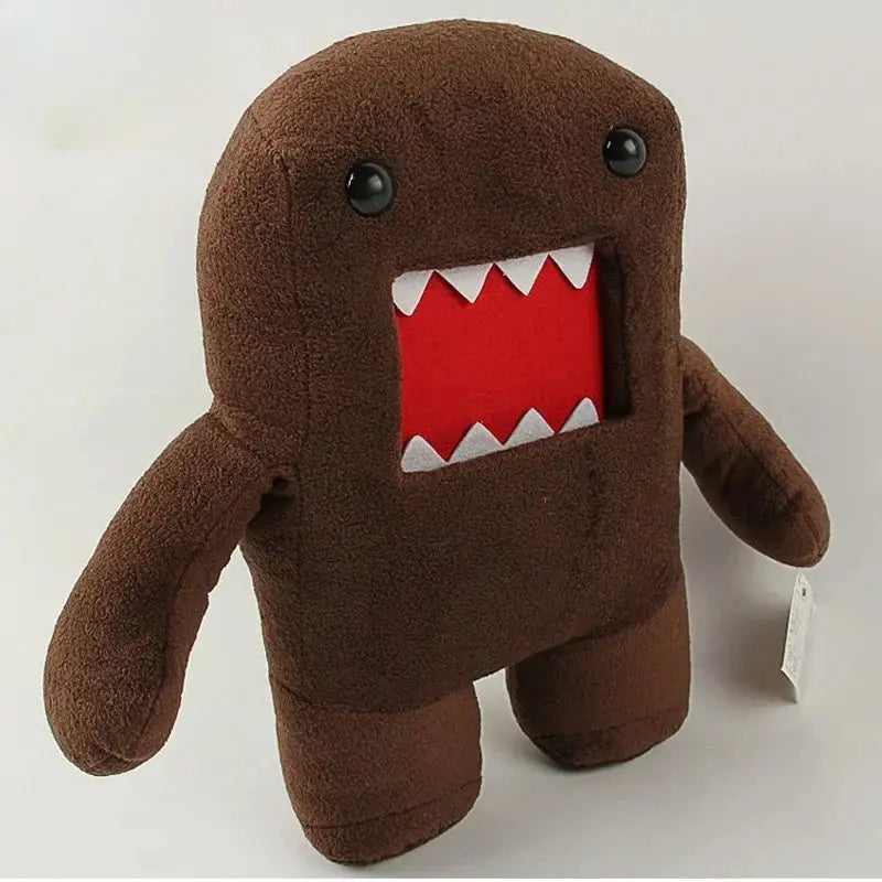 Jouet en peluche Domo Kun de 20 cm, animal en peluche brun présentant des yeux à boutons noirs et une bouche rouge bordée de dents triangulaires blanches.