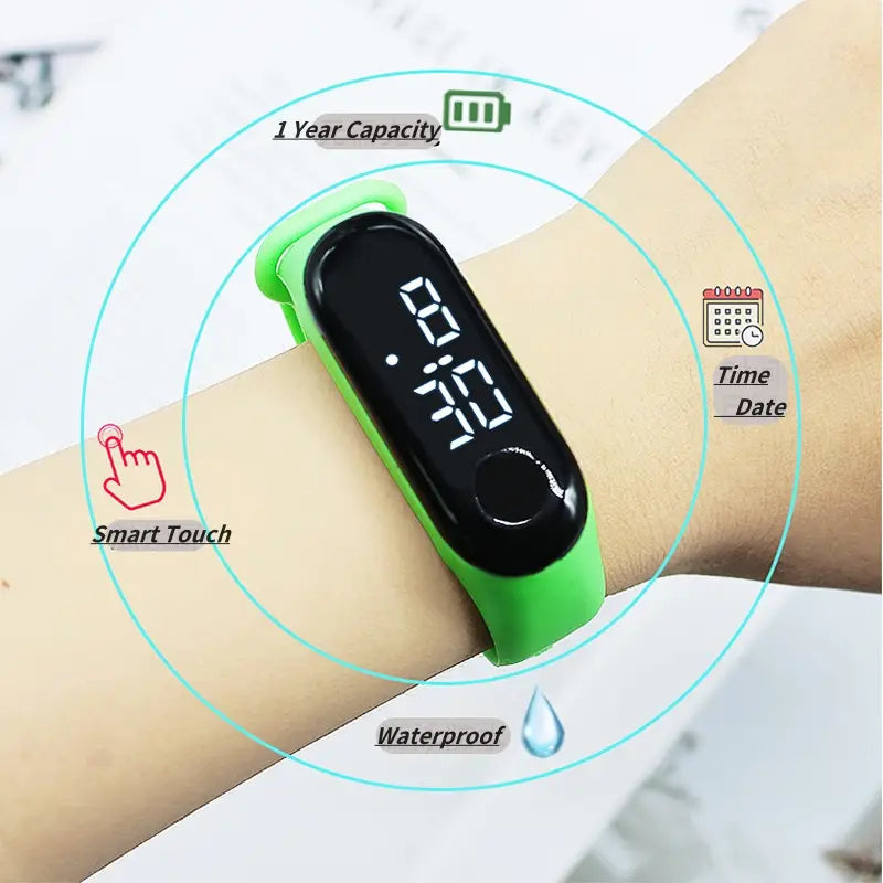Bright green kids LED digital sports watch with black display screen showing time and date waterproof silicone material and smart touch functionality featuring animal charm.