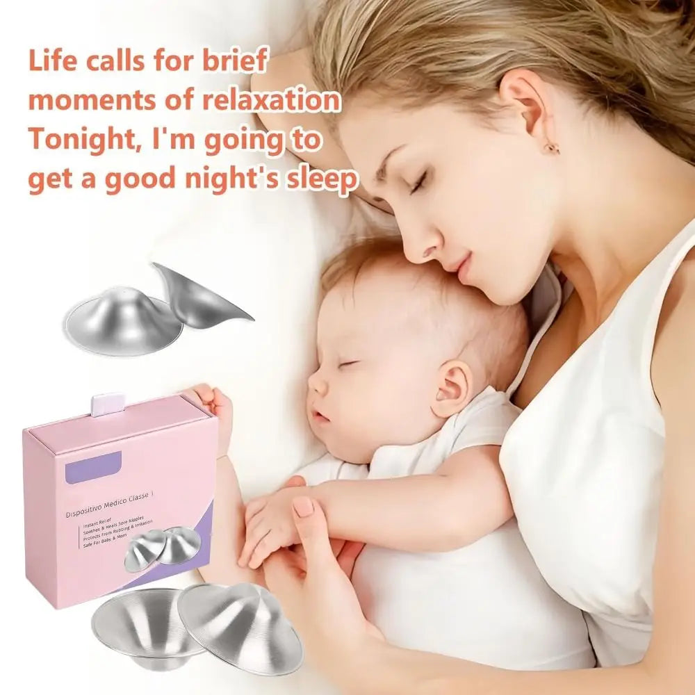 silver metallic nipple shields made of metal displayed in a pink box labeled dispositivo medico classe 1 for soothing breastfeeding soreness