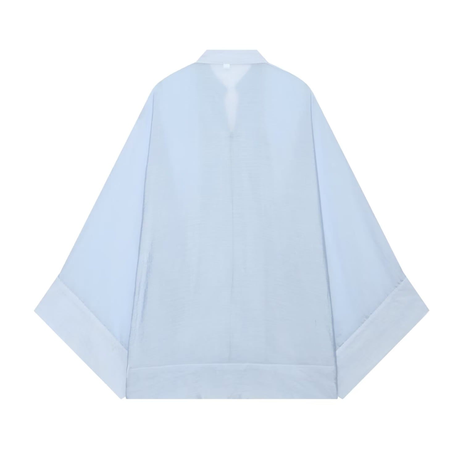Chemise décontractée bleu clair ample à manches amples et col classique, idéale pour un style blouse jaune à manches longues transparente.