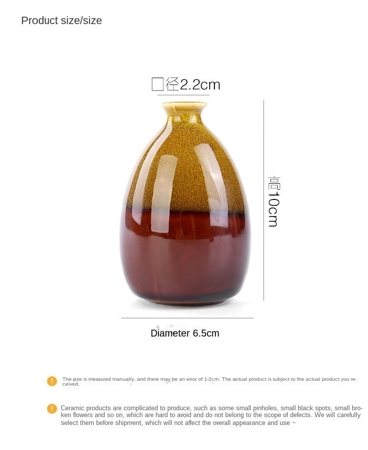 A glossy flower glaze ceramic vase with a gradient amber to deep burgundy finish, rounded body, and narrow neck for home decor.
