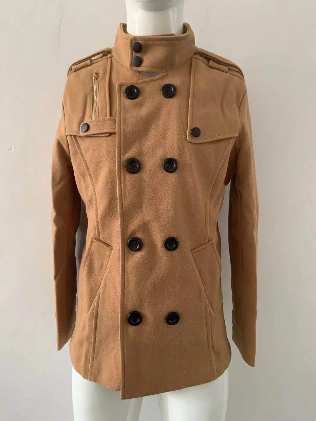 Tan double breasted warm woolen coat for men featuring black buttons and epaulets designed as a woolen jacket for cold weather.