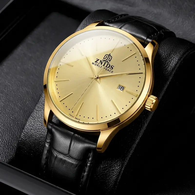 Gold-tone znids world peace automatic skeleton mechanical watch with a black leather strap and a minimalist gold dial.
