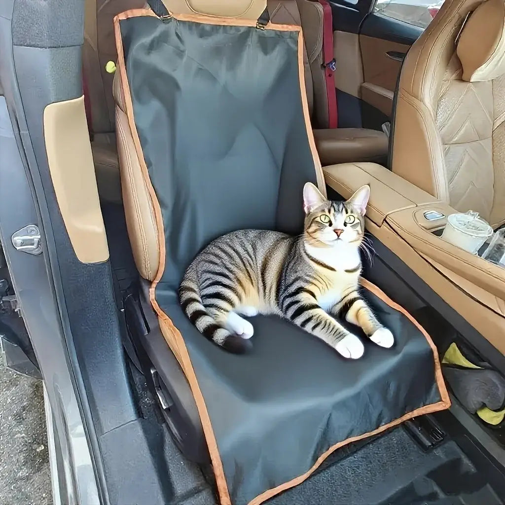Dark gray waterproof dog car seat protector with tan trim and adjustable straps featuring a tabbed design for easy attachment to vehicle seats.