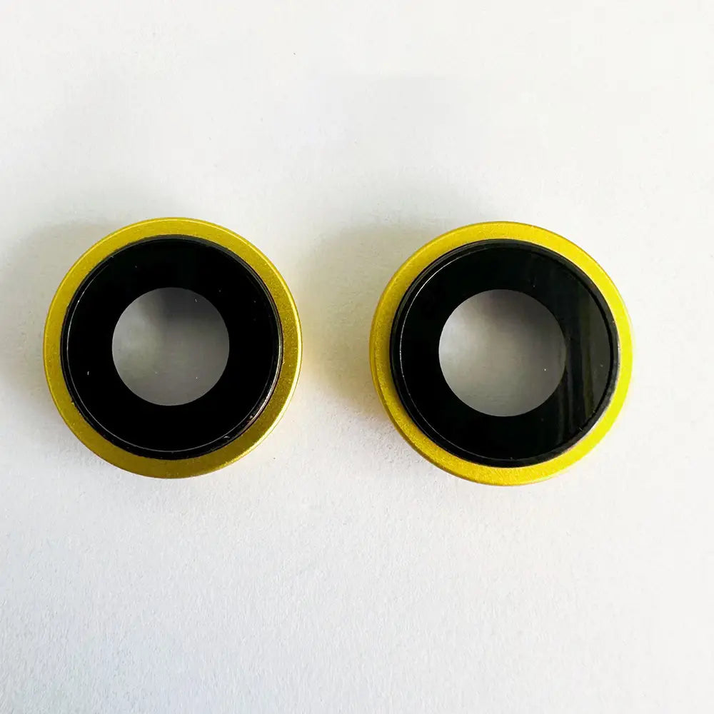two circular iphone 14 series camera lens glass covers with yellow-rimmed black glossy finish designed for modname=ckeditor protection