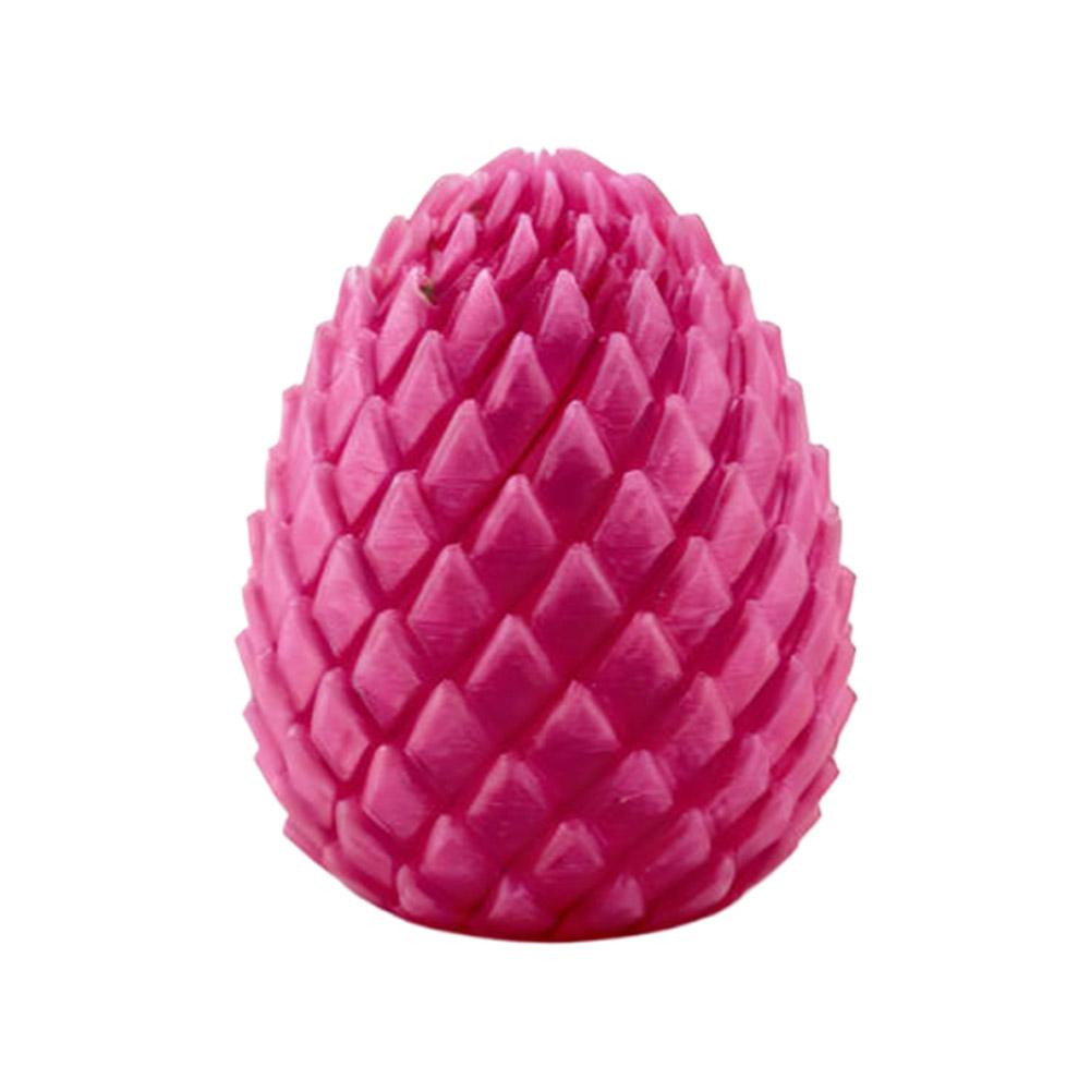 A vibrant pink articulated dragon egg fidget toy with an egg-shaped form and a textured surface resembling overlapping scales.
