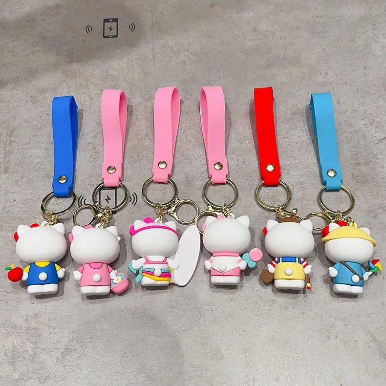 A set of six colorful hello kitty cartoon keychains in soft silicone featuring unique outfits and matching wrist straps for anime bag charm use.