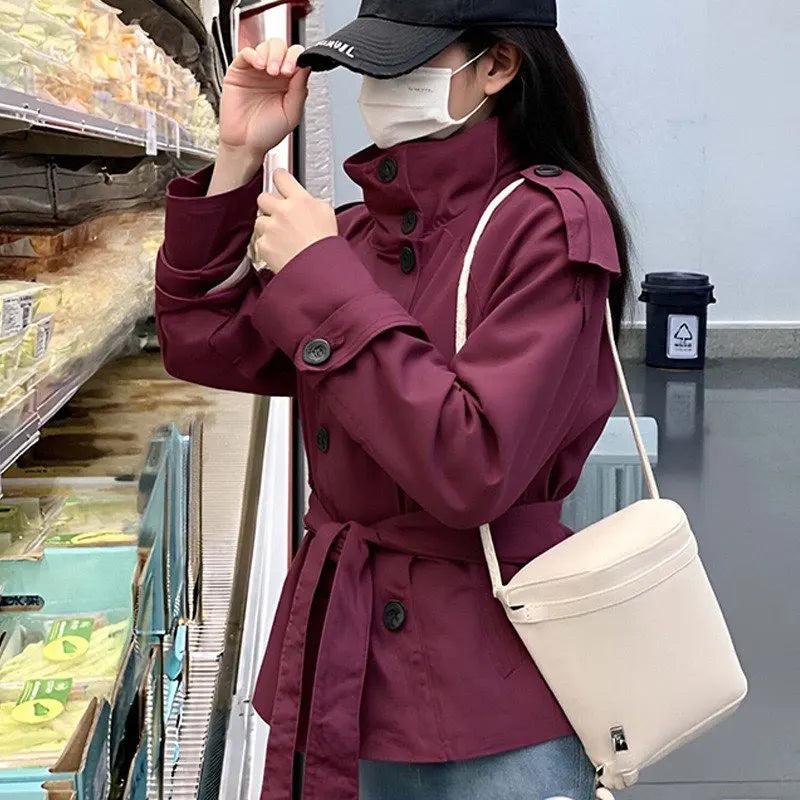 Fashion Belt Short Trench Coat Women Stand Collar Double Breasted Long Sleeve Jacket 2026 Spring Autumn New Lady Street Outwear