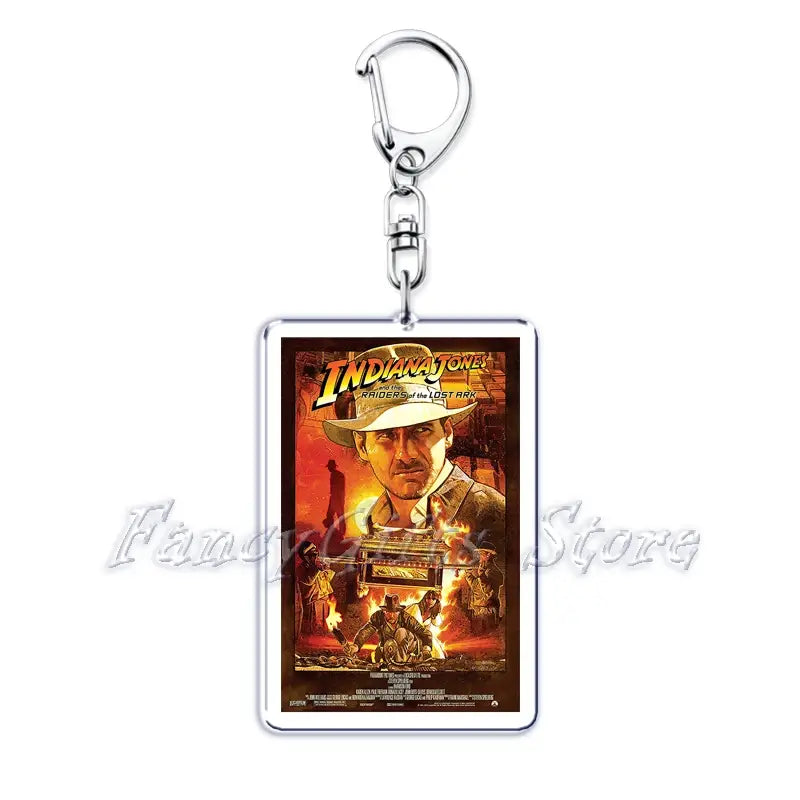 Silver rectangular acrylic keychain featuring a printed indiana jones raiders of the lost ark movie poster from the movie poster acrylic keychain set.