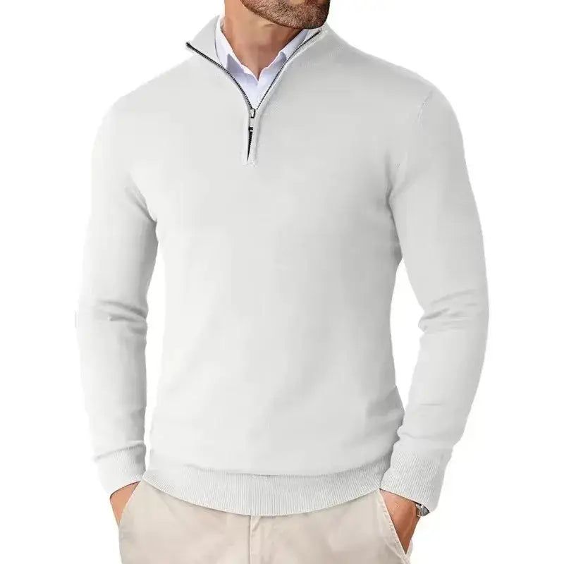 Pull-over homme à col zippé au quart, coupe slim, en gris clair, à manches longues, bas et poignets côtelés.