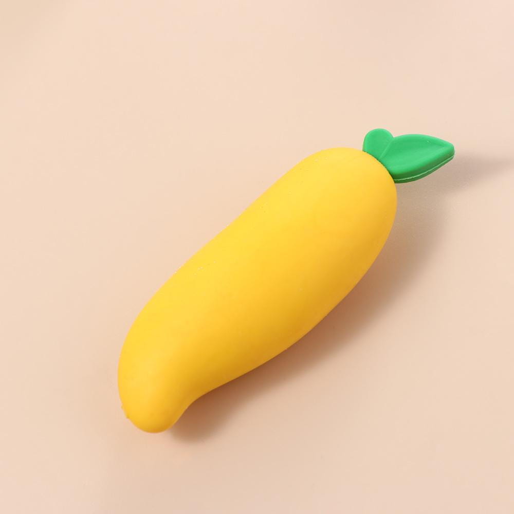 Yellow mango-shaped silicone pencil eraser with a green leafy top from Fruit Pencil Erasers cute student stationery set.
