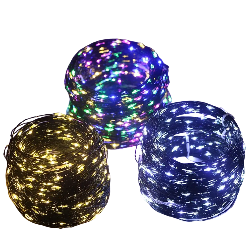 Coiled LED string lights in warm yellow white and multicolor on green copper wire for outdoor garden and party decor