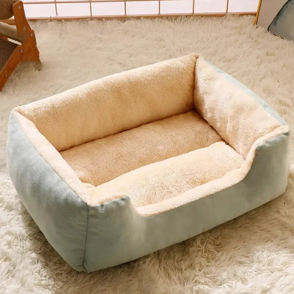 Plush rectangular cat bed soft pet cushion with a light blue exterior and a plush beige interior lining designed for comfortable pet rest.