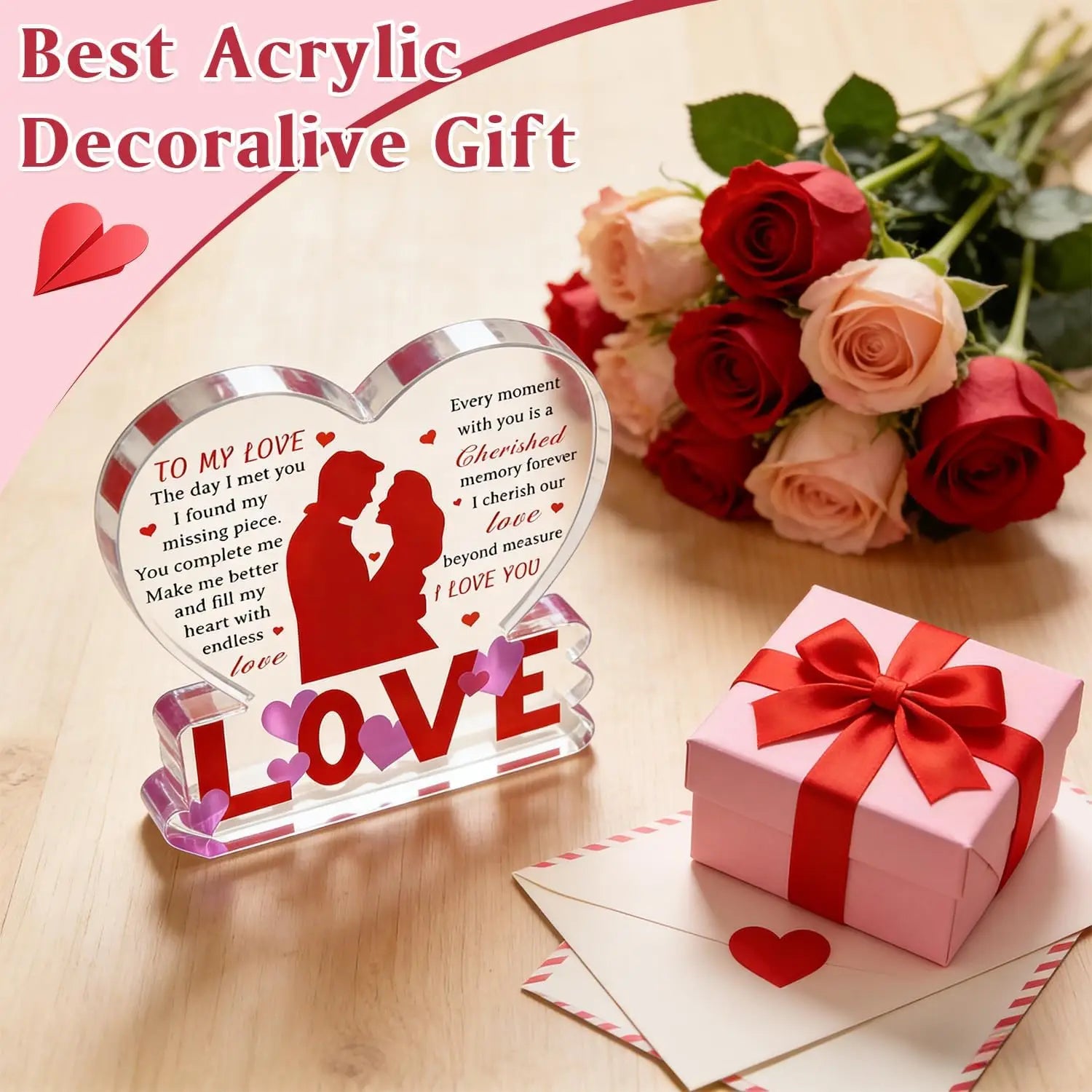 Clear acrylic heart-shaped decorative keepsake with red and purple engraved love message and silhouette featuring the word love in bold red letters at its base ideal as a romantic Valentine gift.