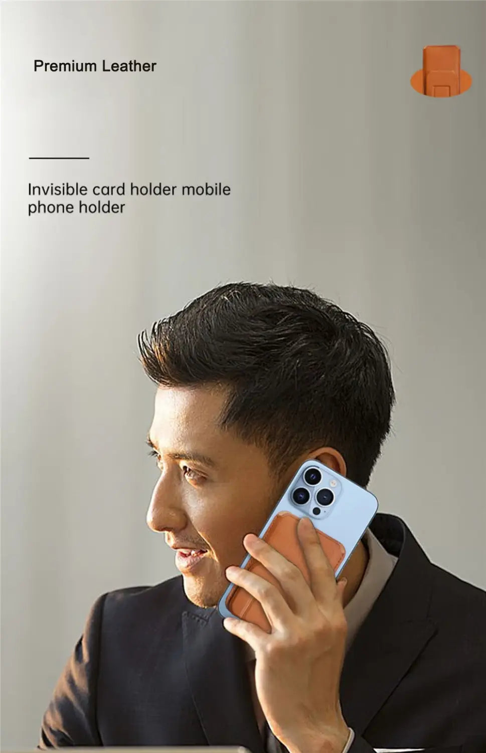 Un support de carte de téléphone magnétique élégant et minimaliste pour iPhone 15 14 13 Pro Max en cuir noir, avec un accent orange discret fixé à l’arrière d’un iPhone.