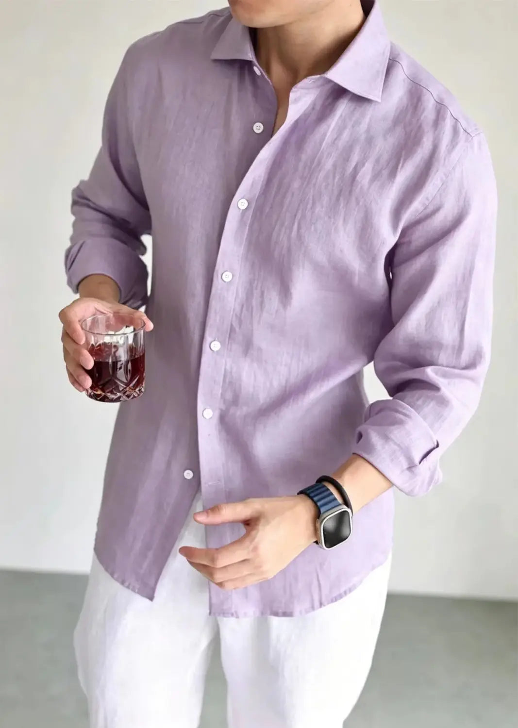 A lavender cotton linen casual button down shirt with a classic collar and rolled up sleeves for men.