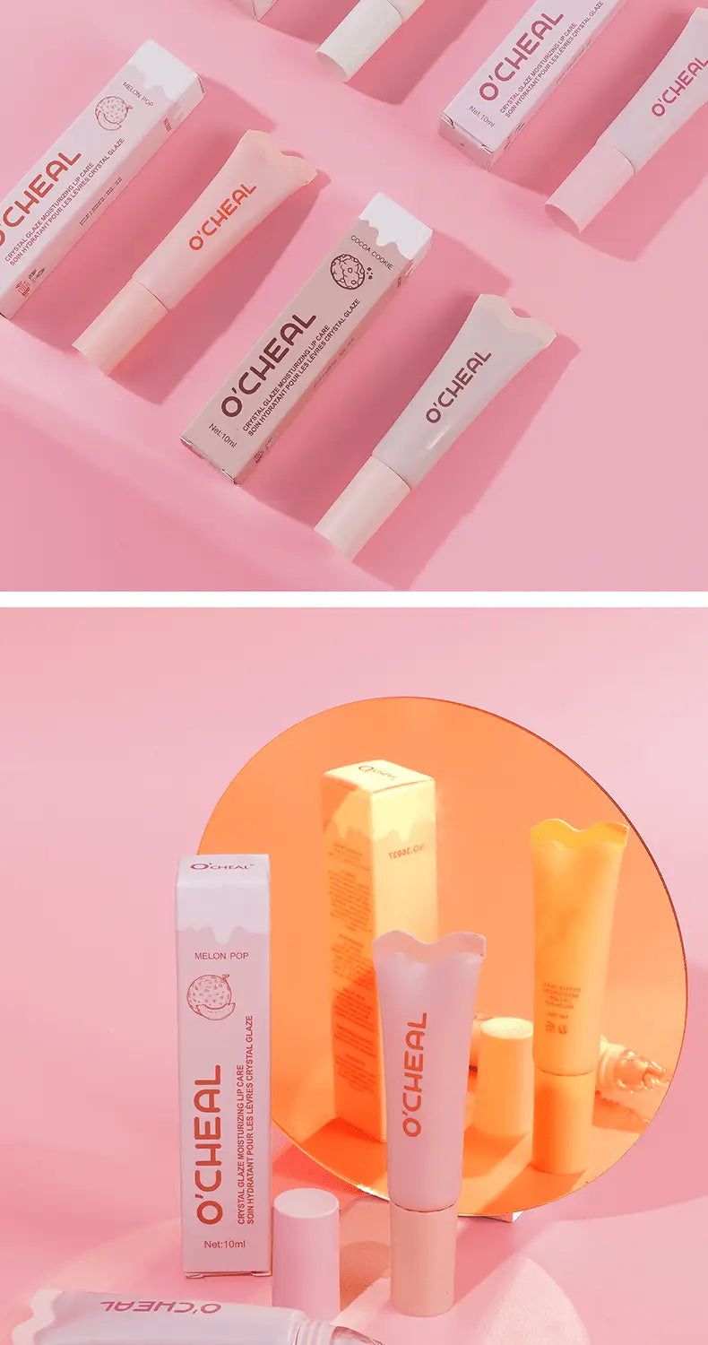 Pink O’cheal hydrating fruit flavored glossy lip balm tubes with white caps and minimalist branding.